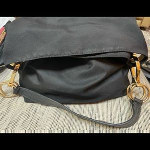 JPK Paris 75, black canvas purse, leather strap.